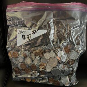 play money!!! 3 large bags of coins and 1 bag of cardboard bills
